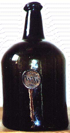 Sealed black glass squat cylinder